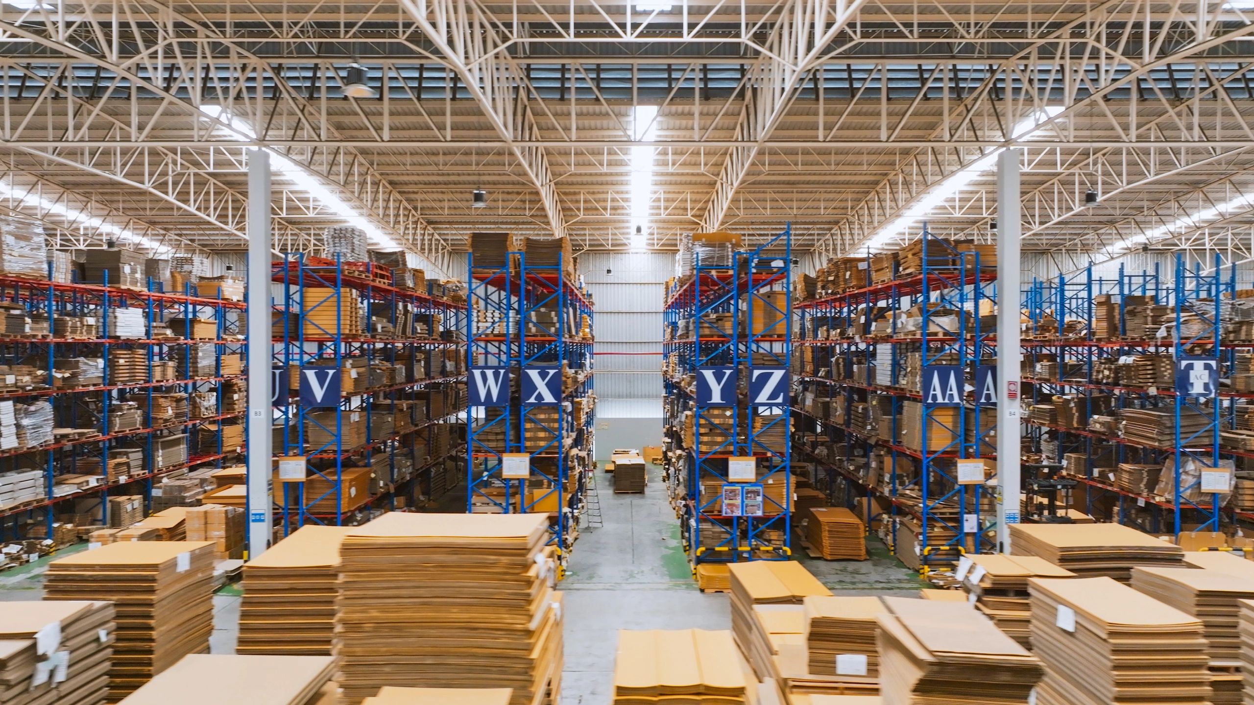 Warehouse shelving with packaged goods ready for fulfillment